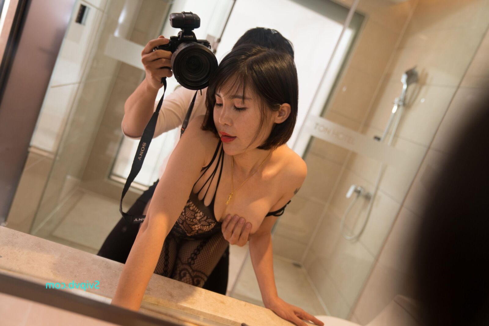 Orange Attractive Chinese Milf in a Sexy Black Bodystocking