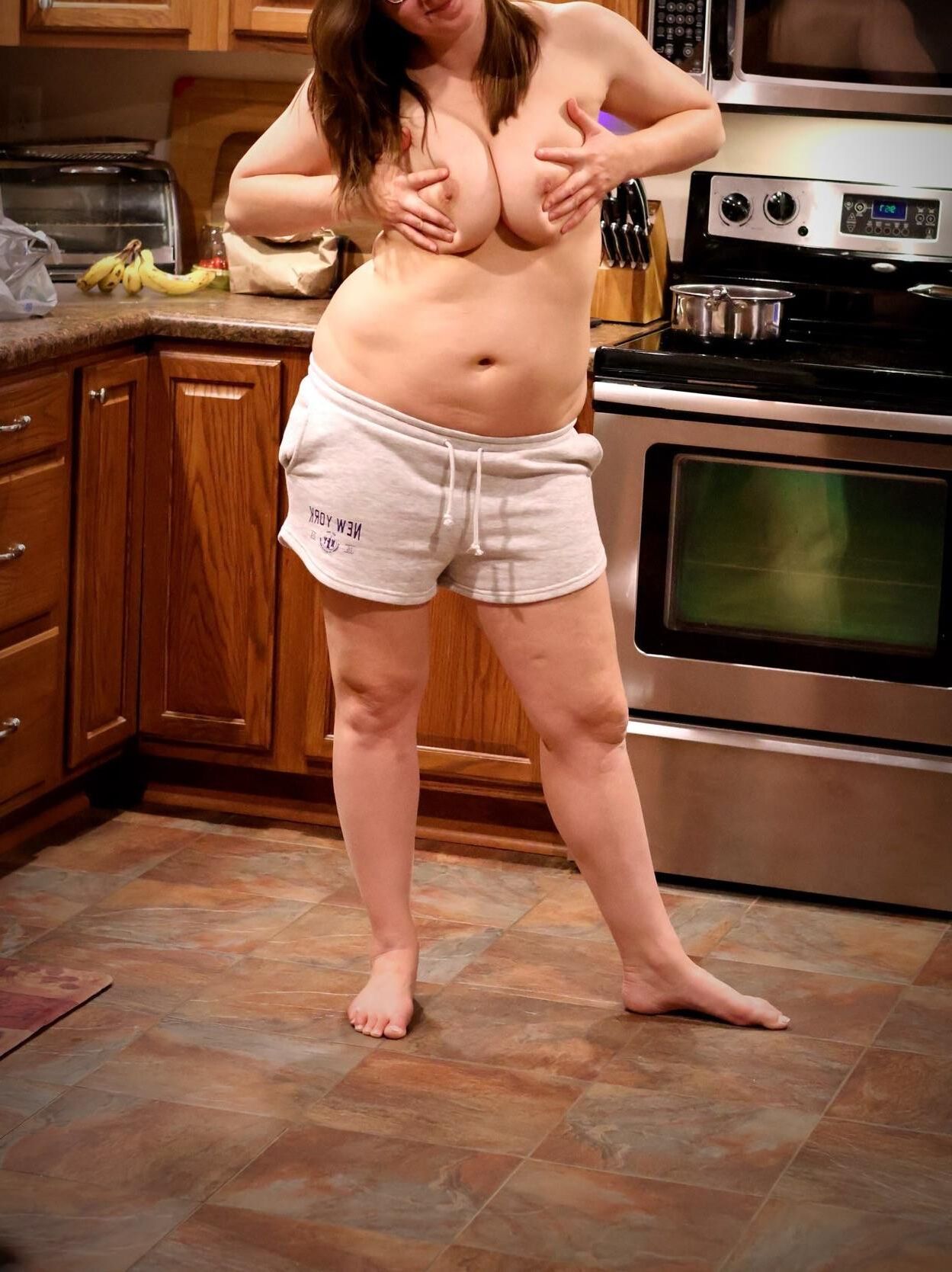 Wife posing around the house and outside and touching herself