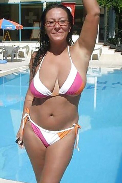Top Busting Swimsuit Tits 