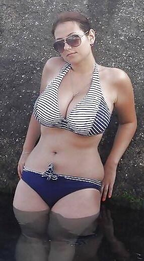Top Busting Swimsuit Tits 