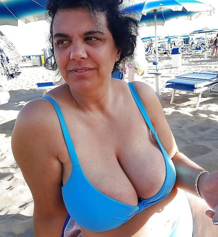 Top Busting Swimsuit Tits 