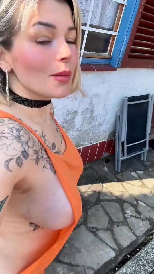 Cute girl flashing boobs
