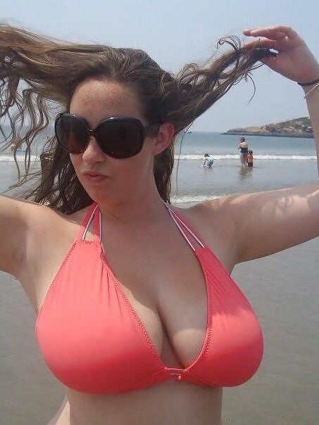 Top Busting Swimsuit Tits 