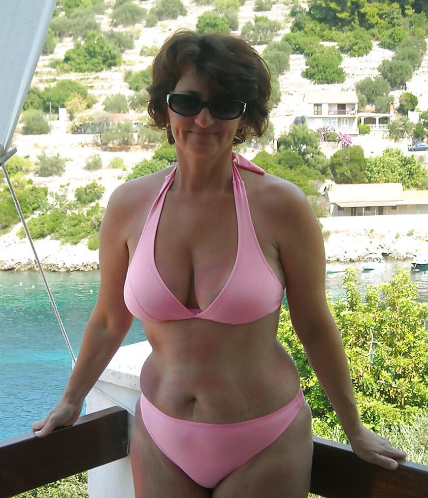 Top Busting Swimsuit Tits 