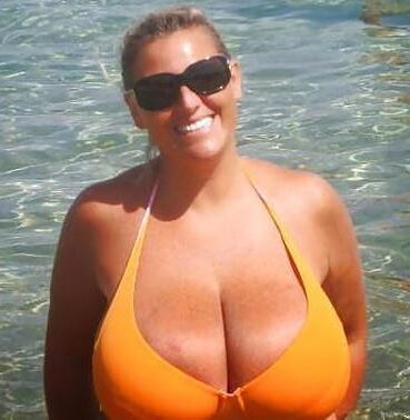 Top Busting Swimsuit Tits 