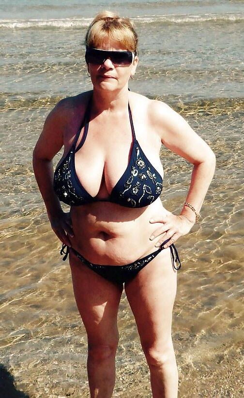 Top Busting Swimsuit Tits 