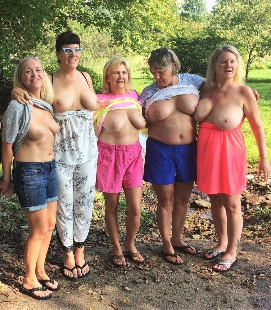 Plain looking wives popping out their tits 