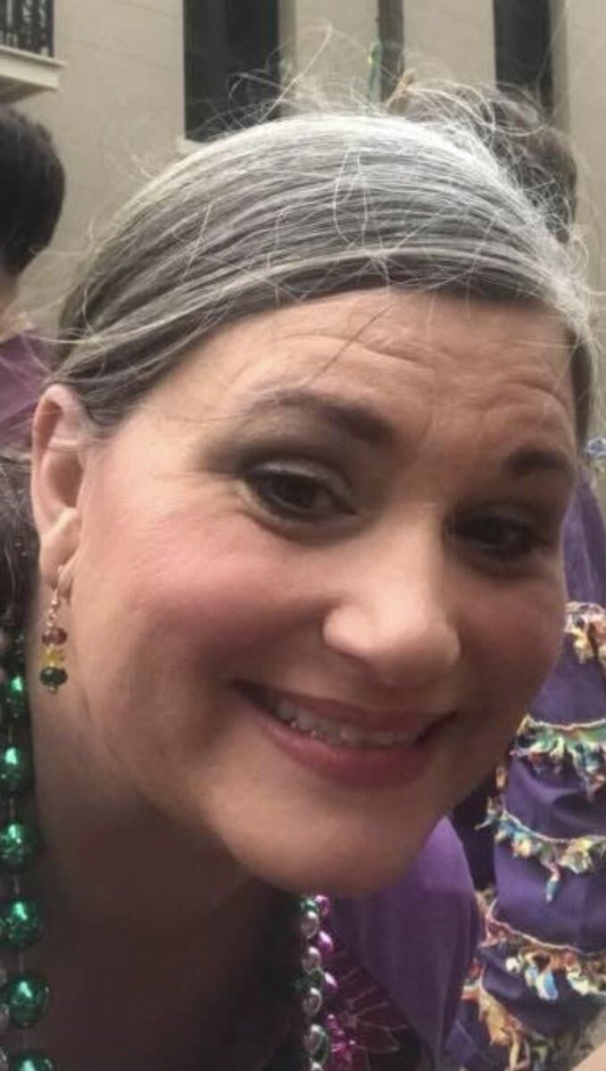  	Aimee flashes her very big titties at mardi gras