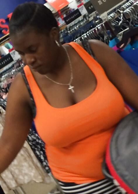 Top Busting Black Tits