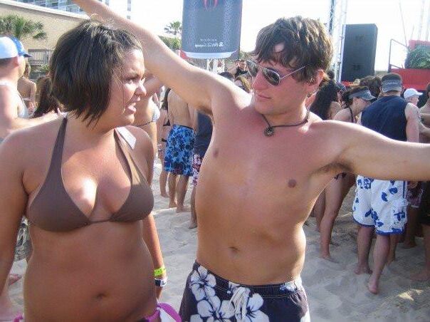 Emily and Elizabeth flash their tits on the beach